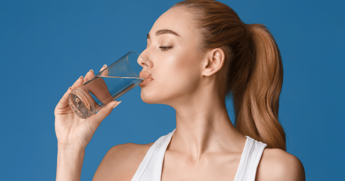 a woman drinking water