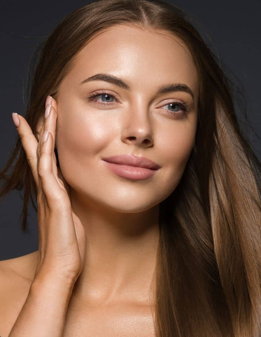 ez-gel-new-beauty-wellness-westport-new-canaan-ct-benefits-of-ez-gel-section A smiling beautiful woman promoting the benefits of EZ Gel in Westport and New Canaan, CT.