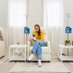 People receiving IV drips in a wellness clinic.